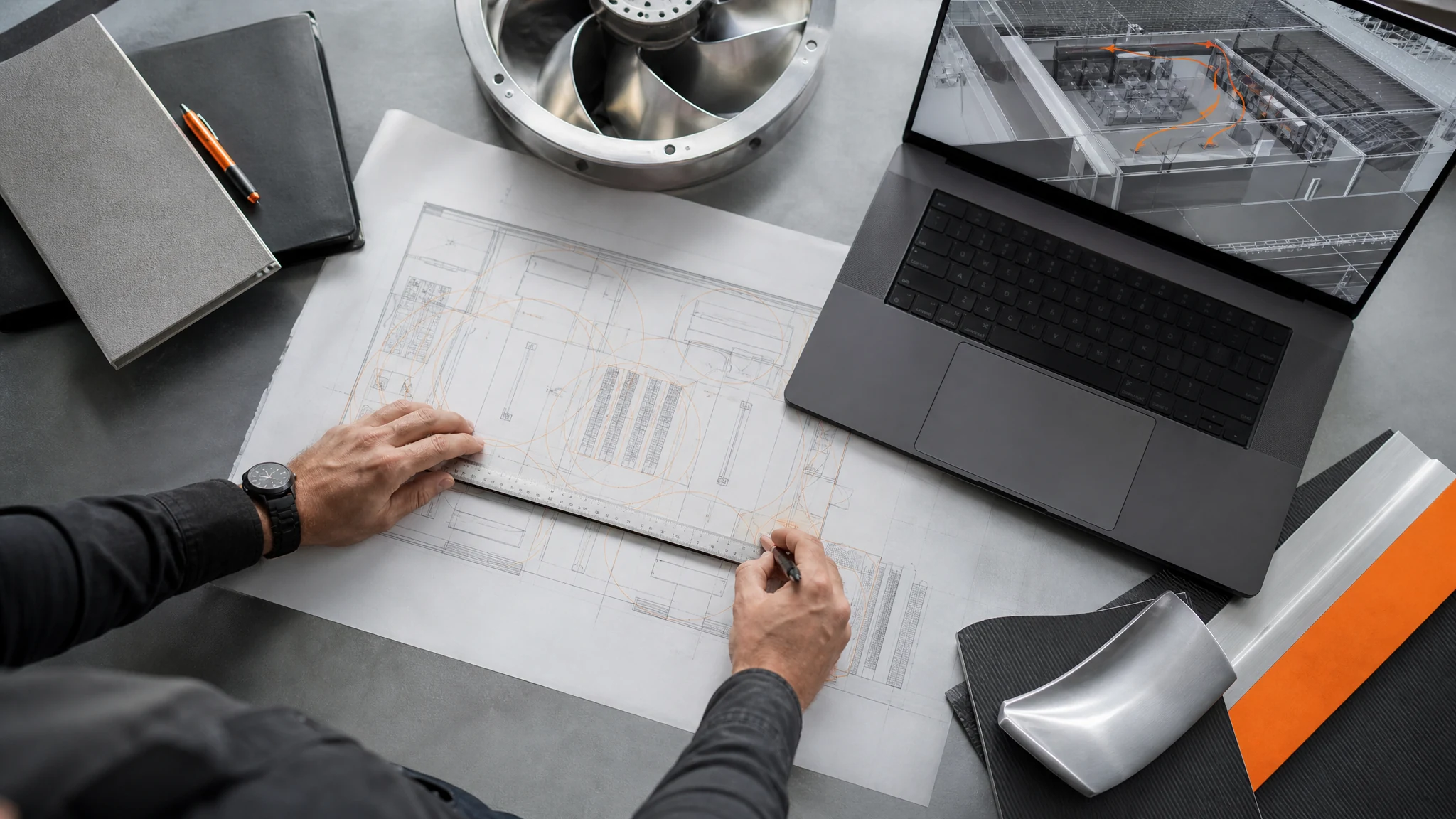 Engineering desk with airflow plan, airfoil sample and measurement tools